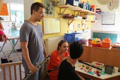 Students play at the local kindergarten, Leï Drole